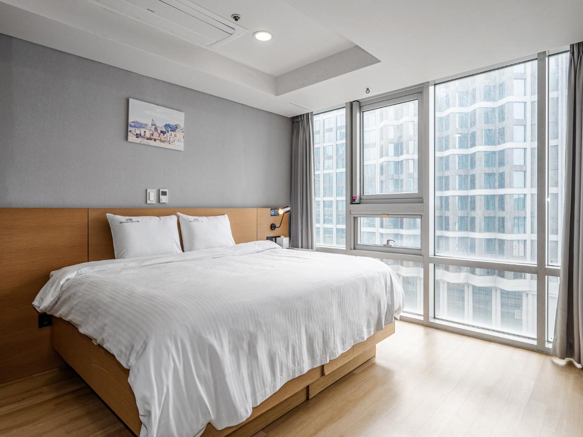 Haeundae Seacloud Hotel Residence Busan Esterno foto
