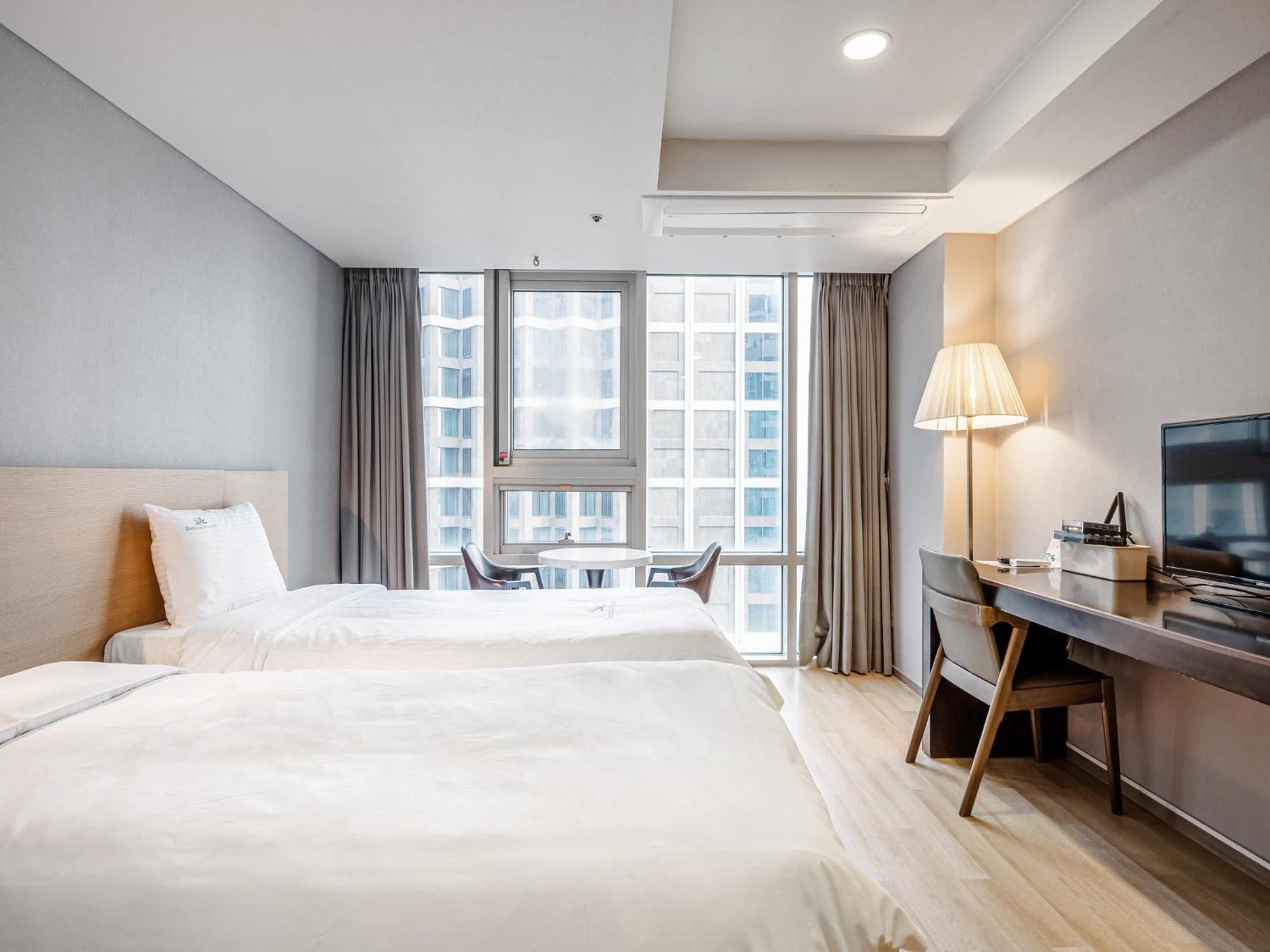 Haeundae Seacloud Hotel Residence Busan Esterno foto