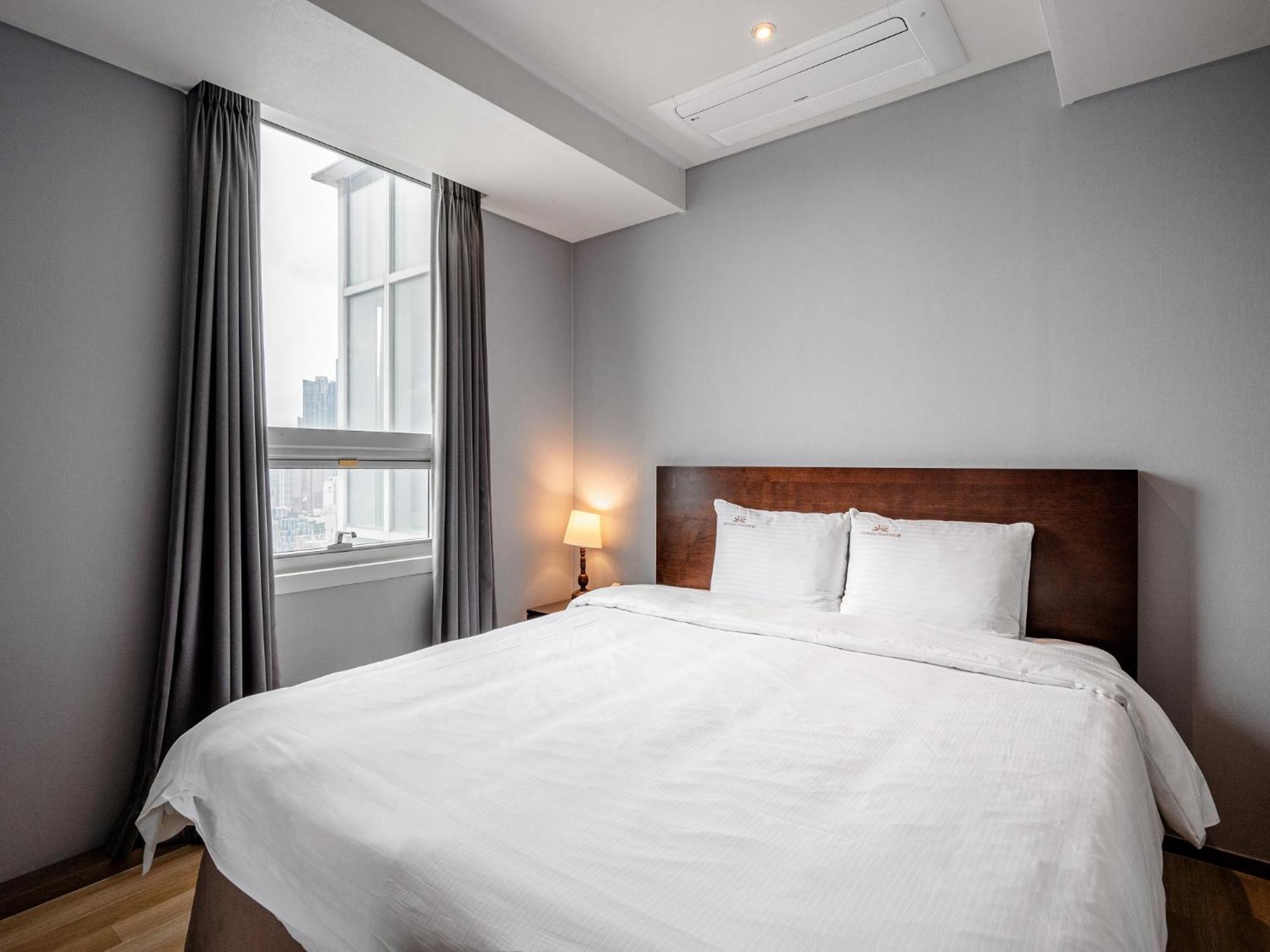 Haeundae Seacloud Hotel Residence Busan Esterno foto