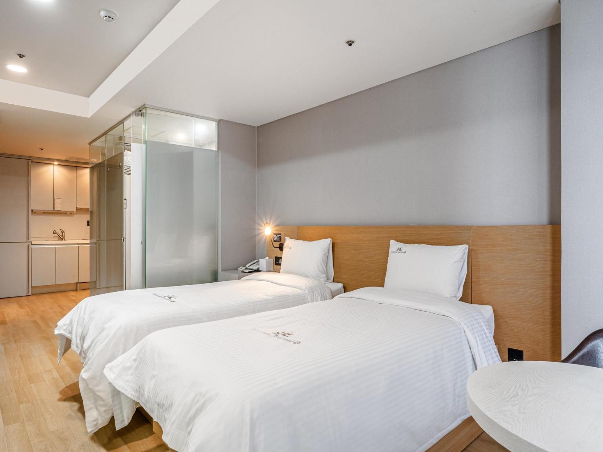 Haeundae Seacloud Hotel Residence Busan Esterno foto